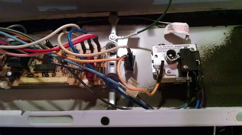 ge gas stove keeps tripping breaker